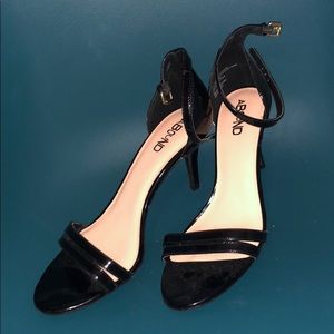 Black patten heels with toe and ankle strap